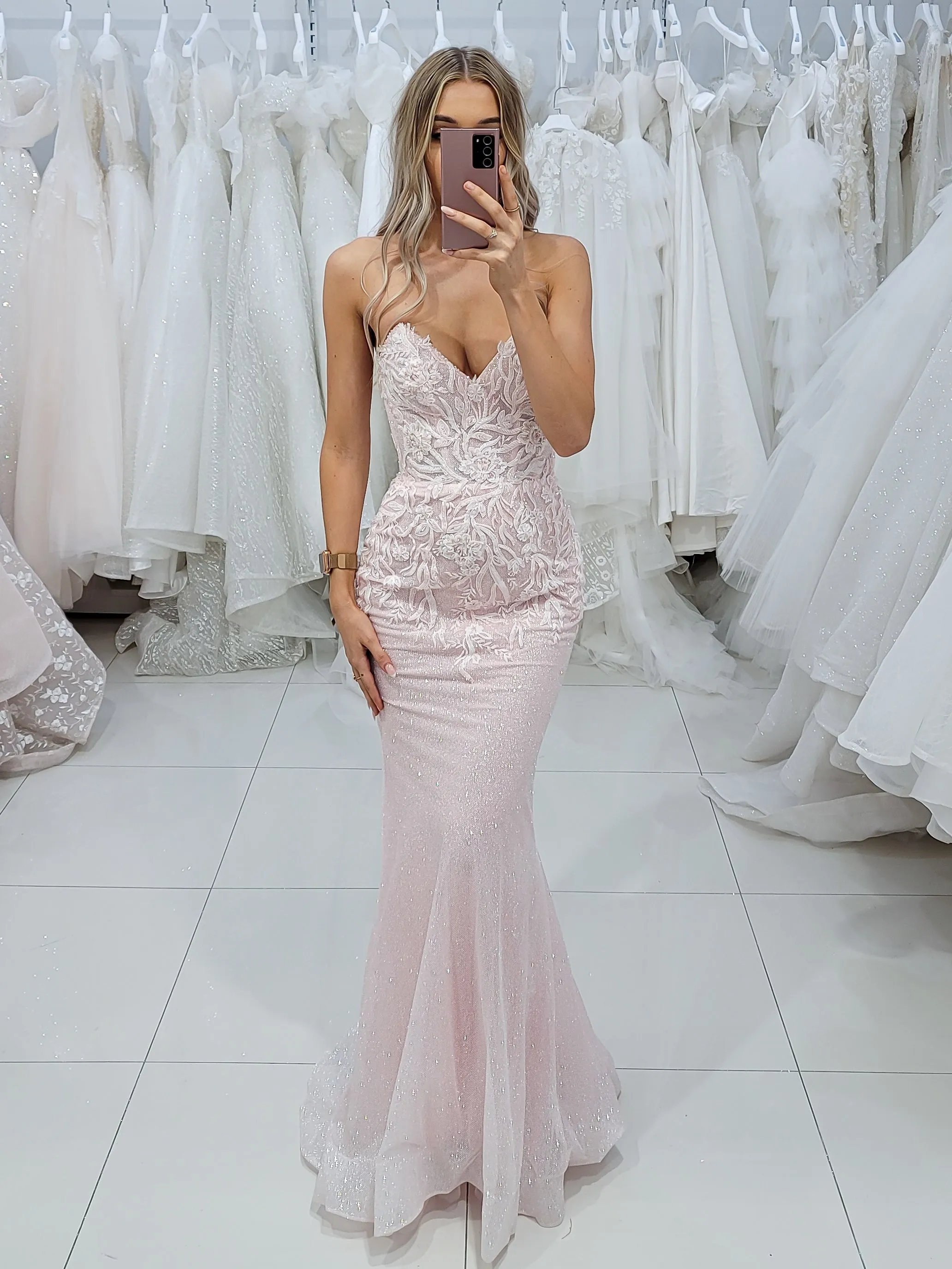 Sparkling pink dress with strapless deep V neckline and corset back