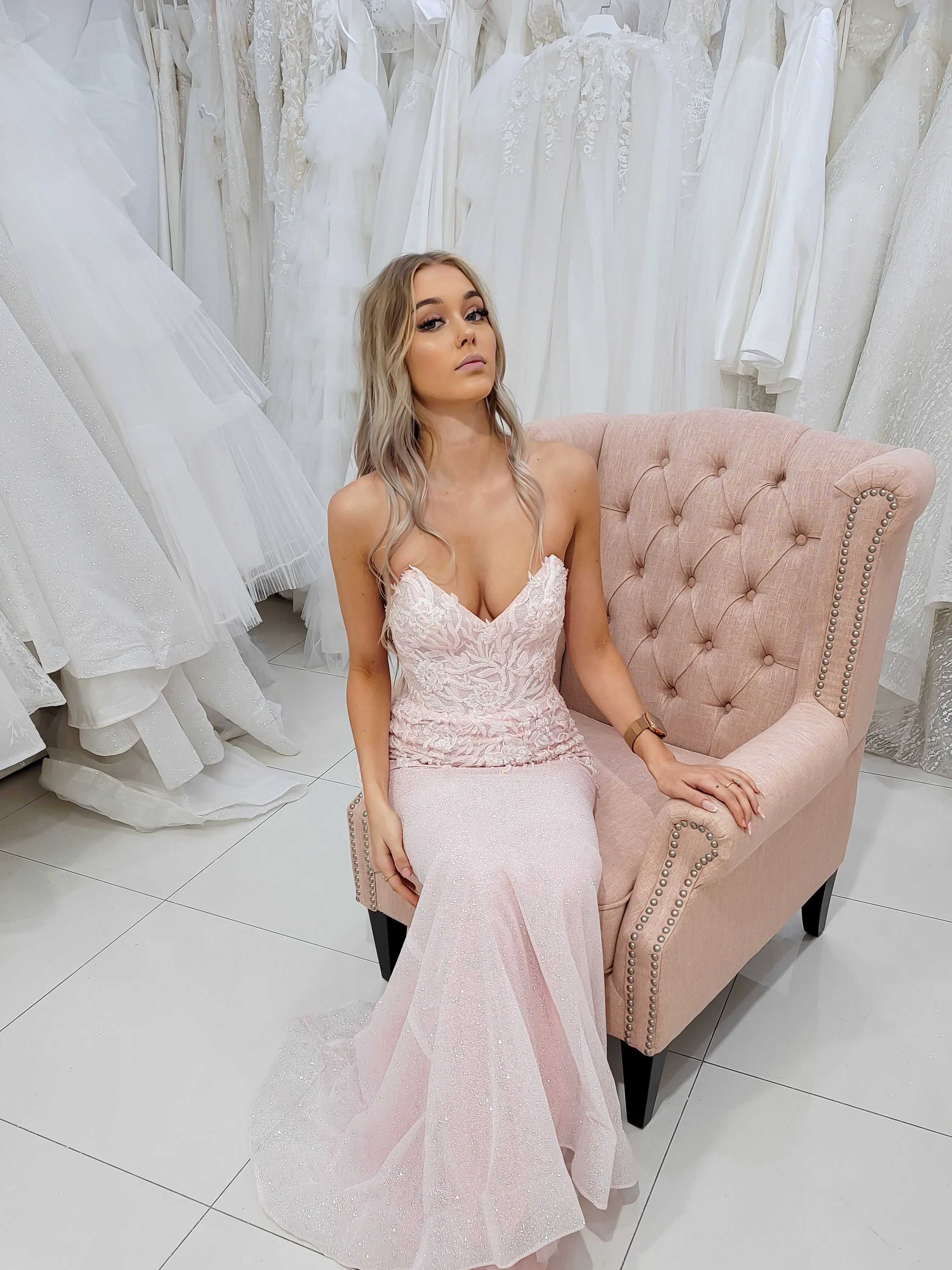 Sparkling pink dress with strapless deep V neckline and corset back