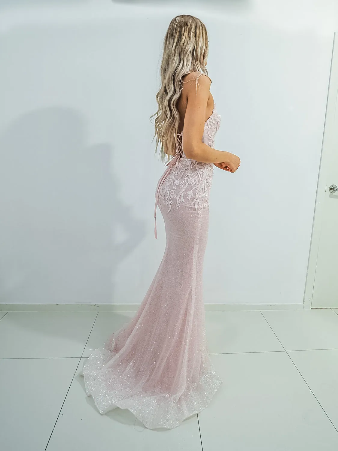 Sparkling pink dress with strapless deep V neckline and corset back