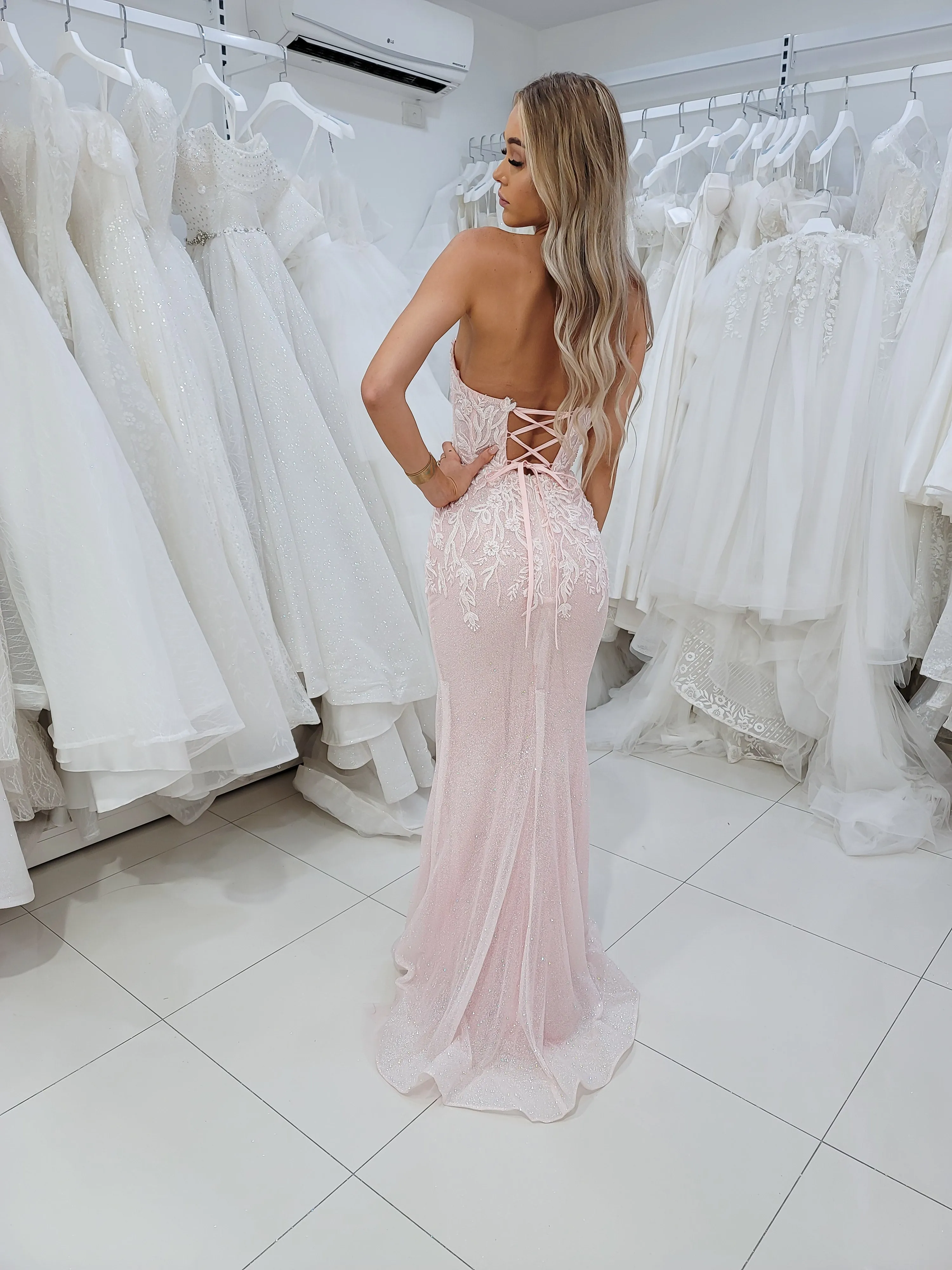 Sparkling pink dress with strapless deep V neckline and corset back