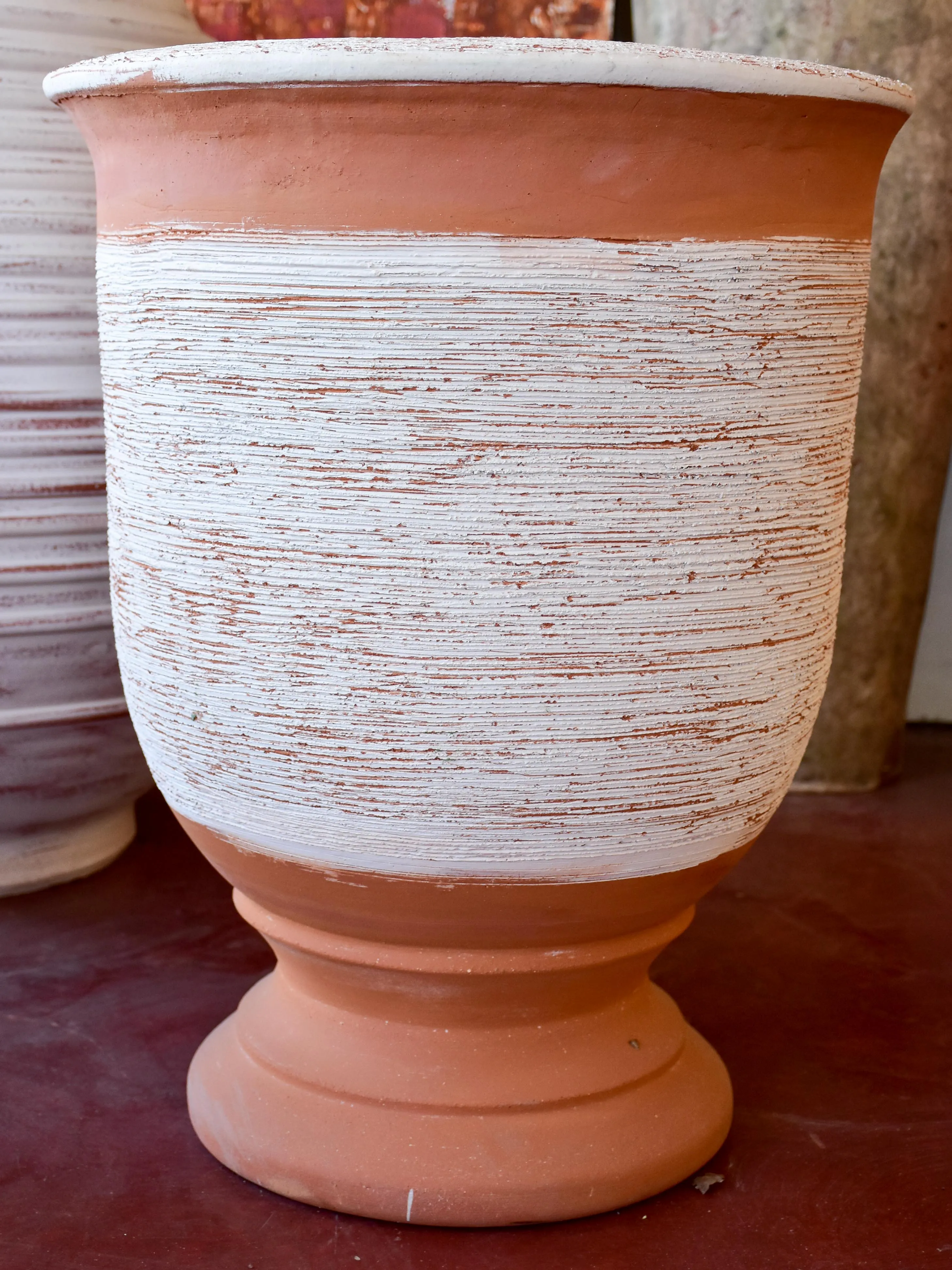 Terracotta Anduze vase with white straw band