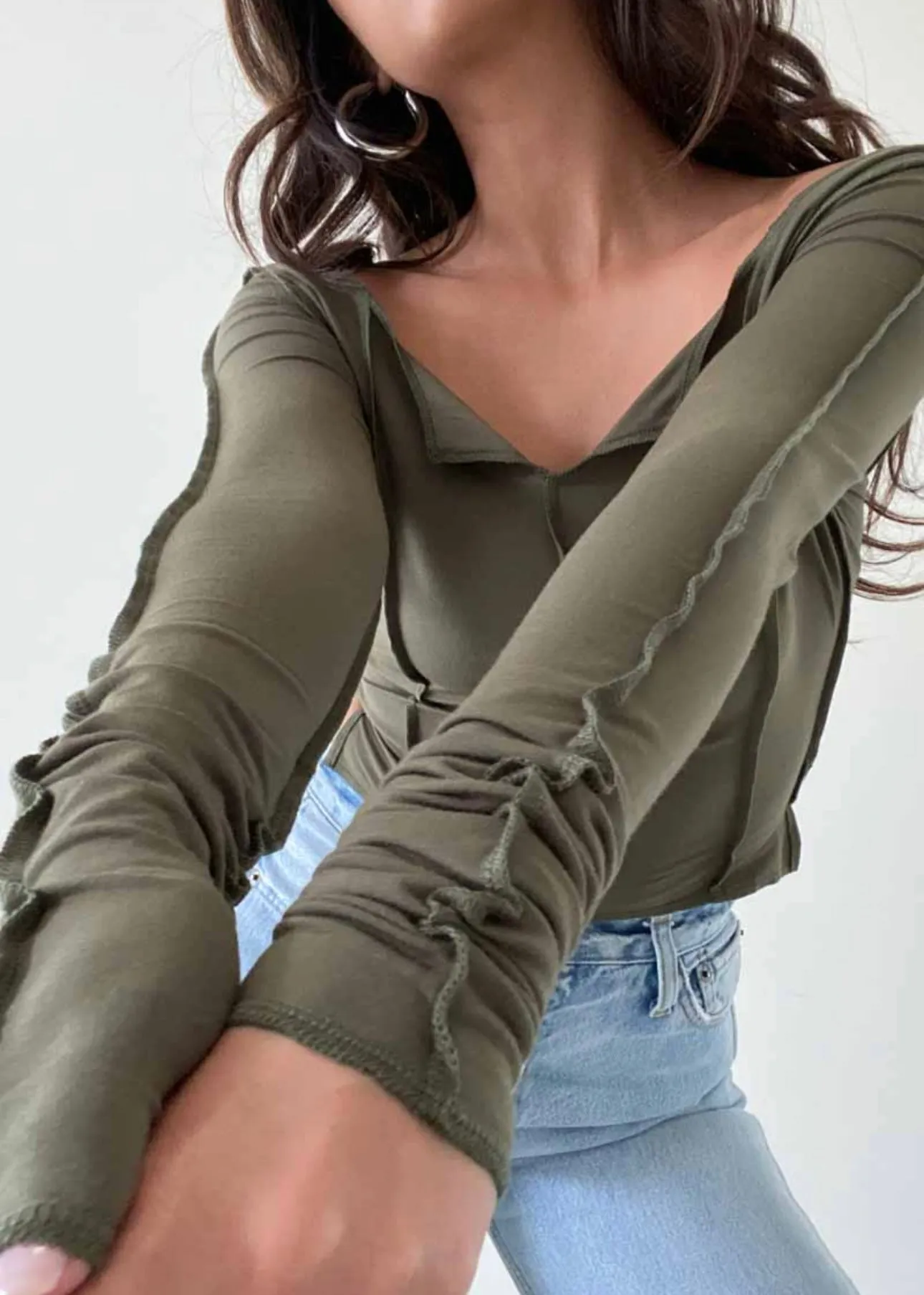 Trend Taker Exposed Seam Top